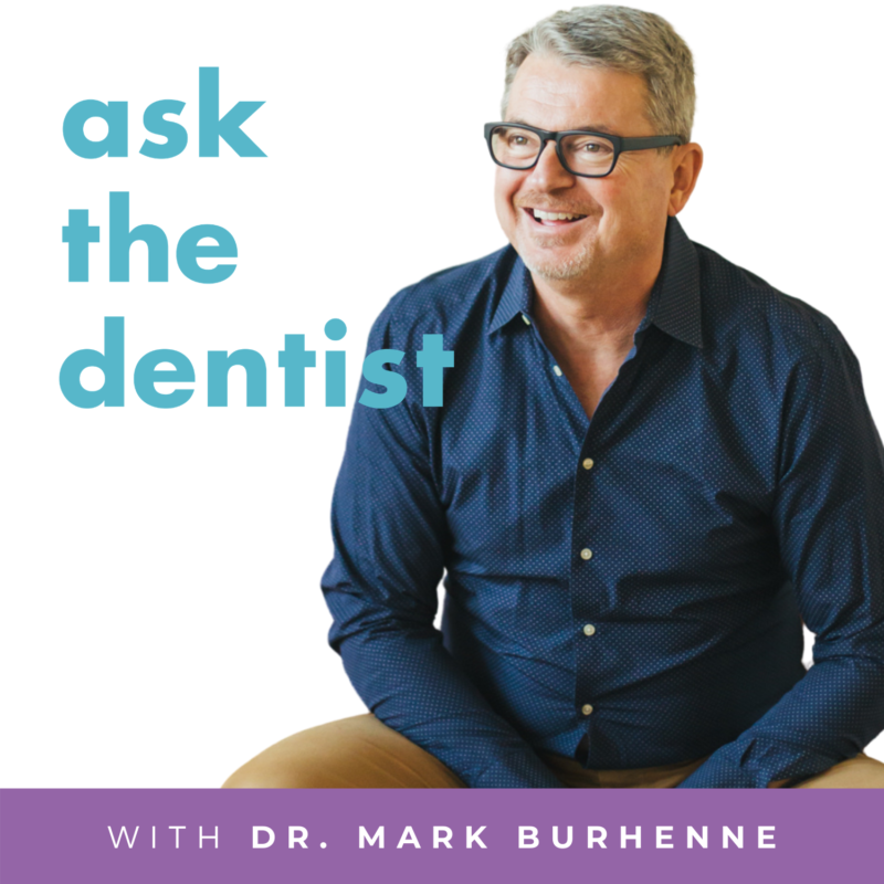 Mark Burhenne smiling in blue shirt with glasses on